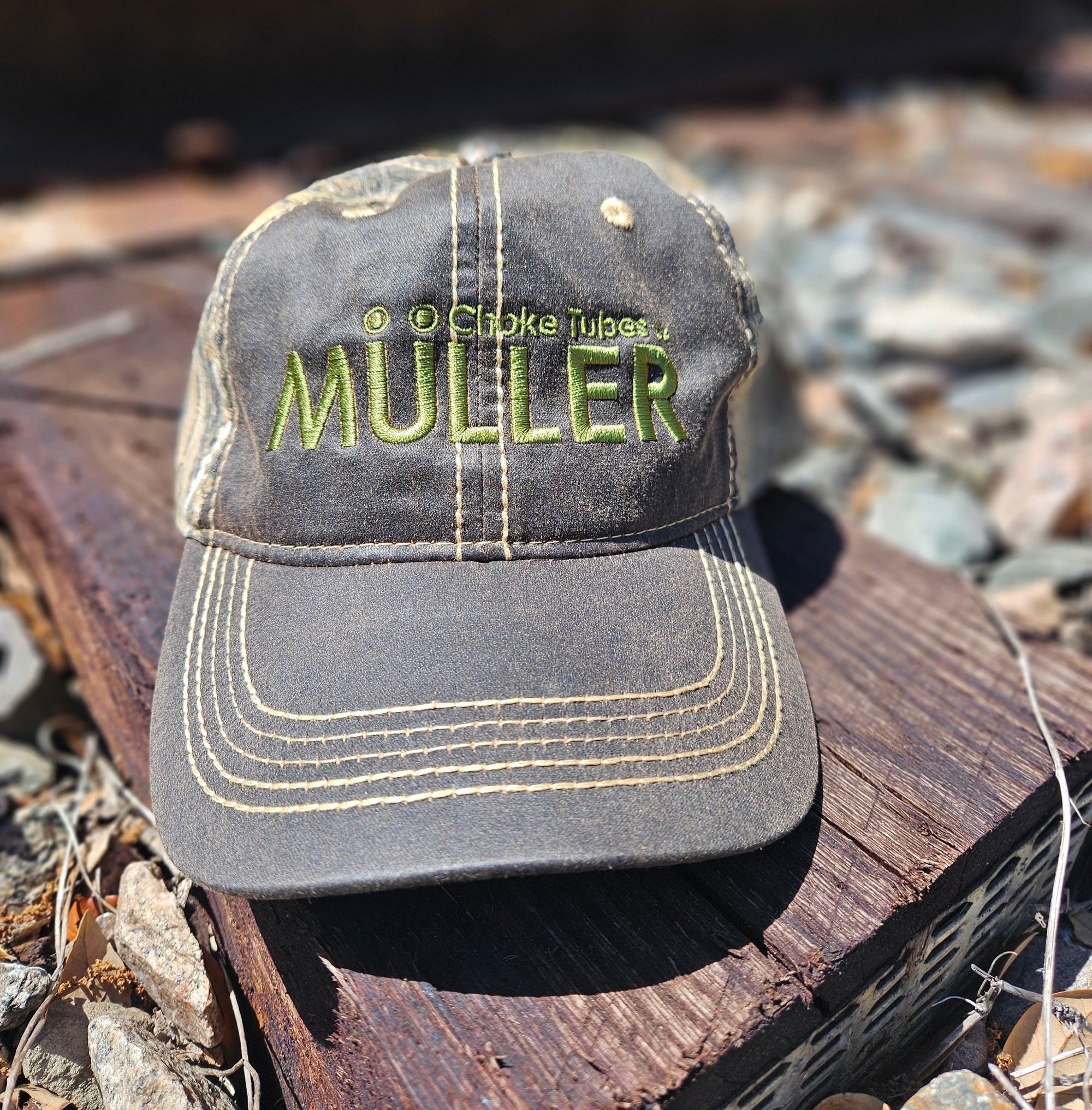 *CAP* Brown Muller Chokes Hunting Cap. Front: Yellow-Green Logo, Back: NEW REALTREE EDGE Camo