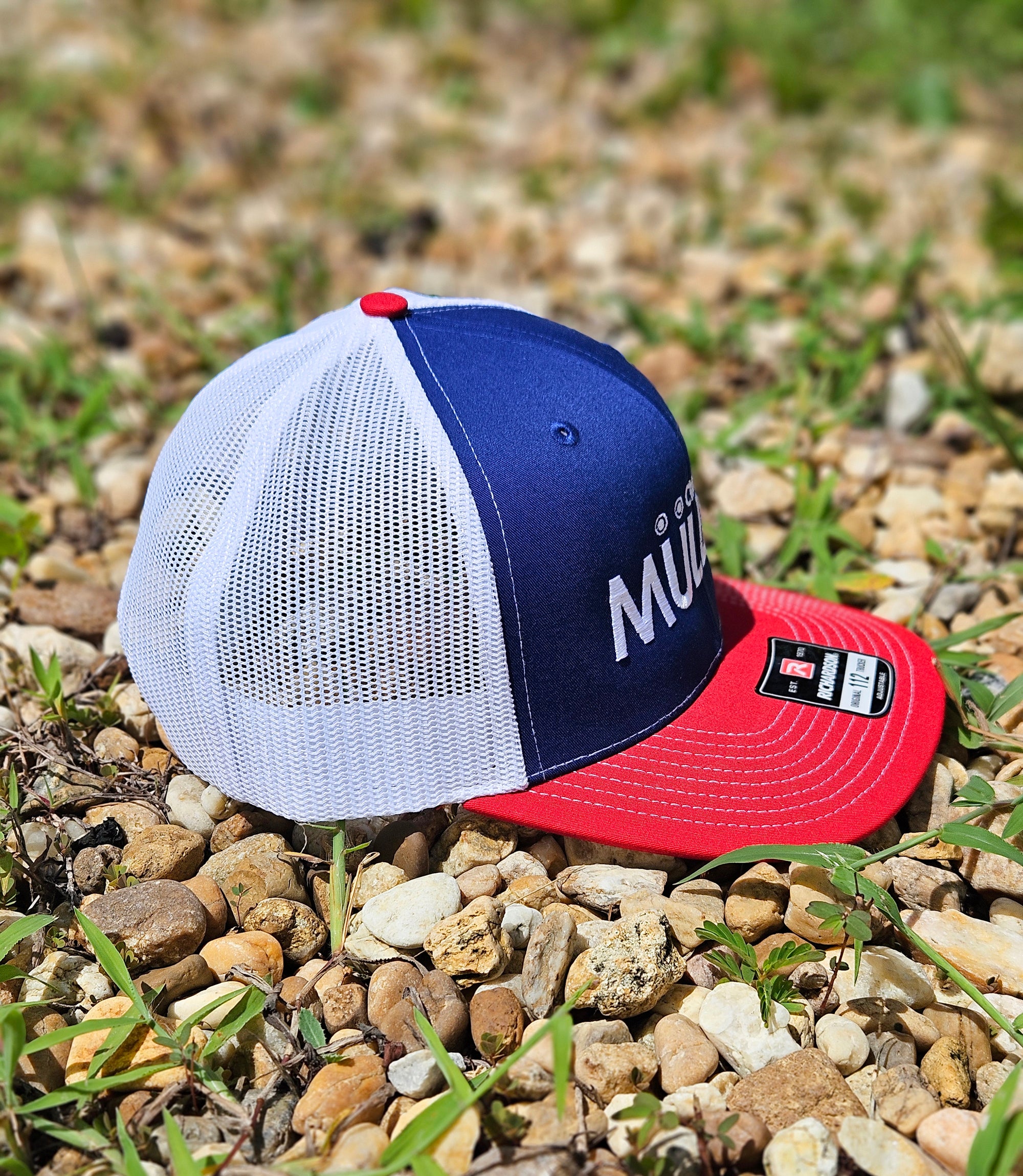 *CAP* Red White & Blue Muller Chokes Cap. Front: White Embroidered Logo, Back: White Mesh