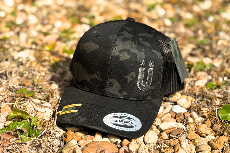 *CAP* U BLACK CAMO Muller Chokes Hunting Cap. Front: Black Camo, Back: Black Trucker Mesh