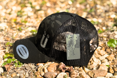 *CAP* U BLACK CAMO Muller Chokes Hunting Cap. Front: Black Camo, Back: Black Trucker Mesh