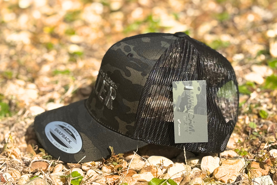*CAP* MC LOGO BLACK CAMO Muller Chokes Hunting Cap. Front: Black Camo, Back: Black Trucker Mesh